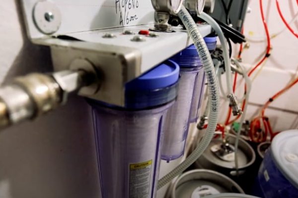 Small electrical wires and containers in a storage closet